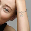 A close-up shot of a woman's arm wearing a silver Pandora bracelet with charms. Anteprima dell’immagine prodotto