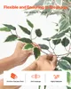 Hands adjusting a fake plant branch, with text overlays highlighting product features. Voir les images du produit