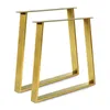 Two gold-colored table legs are shown against a white background. Produktbild-Vorschau