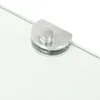 A close-up view of a glass shelf bracket on a clear glass shelf. Anteprima dell’immagine prodotto