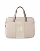 A beige laptop bag with brown handles is shown against a white background. Anteprima dell’immagine prodotto
