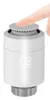 A finger pressing on the top of a white thermostat. Produktbild-Vorschau