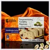 Kandylas Halva mit Pistazien 200 g Verpackung auf orangefarbenem Stoff Produktbild-Vorschau