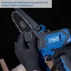A person wearing black gloves is holding and adjusting a blue and black cordless chainsaw. Produktbild-Vorschau