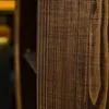 A close-up view of the textured wood grain of a bar. Náhled obrázku produktu