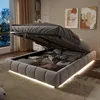 A bedroom scene with a bed that has storage underneath, illuminated by LED lights. Podgląd zdjęcia produktu