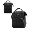Two black backpacks are shown against a white background. The backpack in the foreground is larger and more detailed, while the one in the background is smaller and slightly out of focus. Náhled obrázku produktu