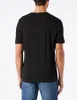 A person wearing a black t-shirt and blue jeans, viewed from the back. Produktbild-Vorschau