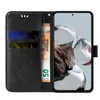 A black flip phone case with floral embossing, showing credit cards and a banknote inside. Produktbild-Vorschau