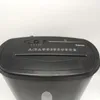 A close-up front view of a black paper shredder against a white background. Produktbild-Vorschau