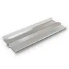 A silver metal grilling accessory is shown on a white background. Produktbild-Vorschau