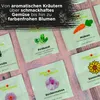 A collection of seed packets arranged on a wooden surface, with text overlaying the top portion of the image. Produktbild-Vorschau