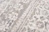 A close-up view of a textured rug with a distressed pattern. Anteprima dell’immagine prodotto