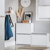 A hallway or entryway with white furniture and decorative items. Podgląd zdjęcia produktu