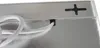 A close-up view of the back of a silver heating panel with a white tube exiting a black grommet. Anteprima dell’immagine prodotto