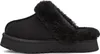 A black UGG slipper with a fluffy trim is shown from the side. Anteprima dell’immagine prodotto