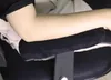 A person's arm resting on a black armrest cushion attached to a chair. Produktbild-Vorschau
