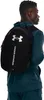 A person wearing a black Under Armour backpack. Náhled obrázku produktu