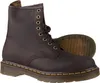 A studio shot of a pair of brown leather boots. Voir les images du produit