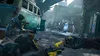 A group of soldiers in tactical gear are engaged in a firefight with alien-like creatures in a war-torn urban environment. Produktbild-Vorschau