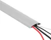 A close-up, angled view of a gray cable management channel with red, black, and white wires emerging from one end. Produktbild-Vorschau