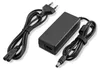 A black power adapter with two cables, one with a European plug and the other with a connector for a device. Produktbild-Vorschau