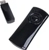 A black media remote and its USB receiver are shown against a white background. Produktbild-Vorschau