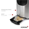 Close-up of a toaster with crumbs in the tray, highlighting its features. Produktbild-Vorschau