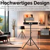 A heater on a tripod stand in a living room setting. Produktbild-Vorschau