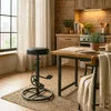 A bar stool and dining table in a kitchen setting. Produktbild-Vorschau