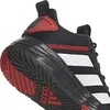 A close-up view of the heel and sole of a black Adidas basketball shoe with white stripes and red accents. Podgląd zdjęcia produktu