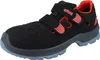A black safety shoe with red accents and a gray sole is shown against a white background. Produktbild-Vorschau