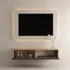A modern TV board mounted on a wall, with a TV above it. Produktbild-Vorschau