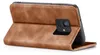 A brown flip cover case for a smartphone is shown from the side, with the cover open to reveal the camera cutout. Produktbild-Vorschau