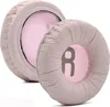 Two pink and gray headphone ear pads are shown on a white background. Voir les images du produit