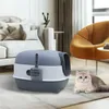 A cat litter box and a cat are placed on a rug in a living room setting. Náhled obrázku produktu