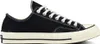 A black Converse Chuck 70 low-top sneaker with white laces and a white sole, shown from the side against a white background. Anteprima dell’immagine prodotto