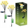 The image shows two solar garden lights shaped like mushrooms and the product's packaging. Produktbild-Vorschau