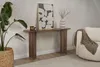 A console table with decor in a living room setting. Voir les images du produit