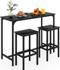 A black bar table with two black bar stools, set against a white background. Oranges and a loaf of bread are on the table. Anteprima dell’immagine prodotto