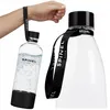 A hand holding a soda maker bottle with a black strap around the neck, and a close-up of another soda maker bottle with a similar strap. Produktbild-Vorschau