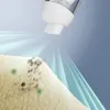 A close-up of a fluffy surface with dirt and green spots, being sprayed by a white nozzle. Produktbild-Vorschau