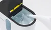 Water being poured into an open humidifier tank, with a cleaning brush attached to the lid. Produktbild-Vorschau