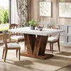 A dining table set in a dining room with curtains and artwork. Anteprima dell’immagine prodotto