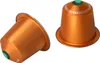 Two coffee capsules are shown against a white background. Produktbild-Vorschau