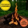 A campfire with logs and fire starters in a forest setting. Produktbild-Vorschau