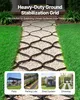 A pathway made of gravel and a black grid system, bordered by green grass, with smaller images of applications at the bottom. Produktbild-Vorschau