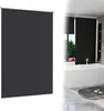 A split image showing a dark roller blind on the left and a modern bathroom with a bathtub on the right. Produktbild-Vorschau