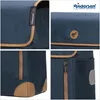 A collage of four close-up images of a blue shopper bag with brown trim and details. Podgląd zdjęcia produktu