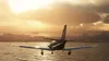 A small airplane flying over water with a city and sunset in the background. Produktbild-Vorschau